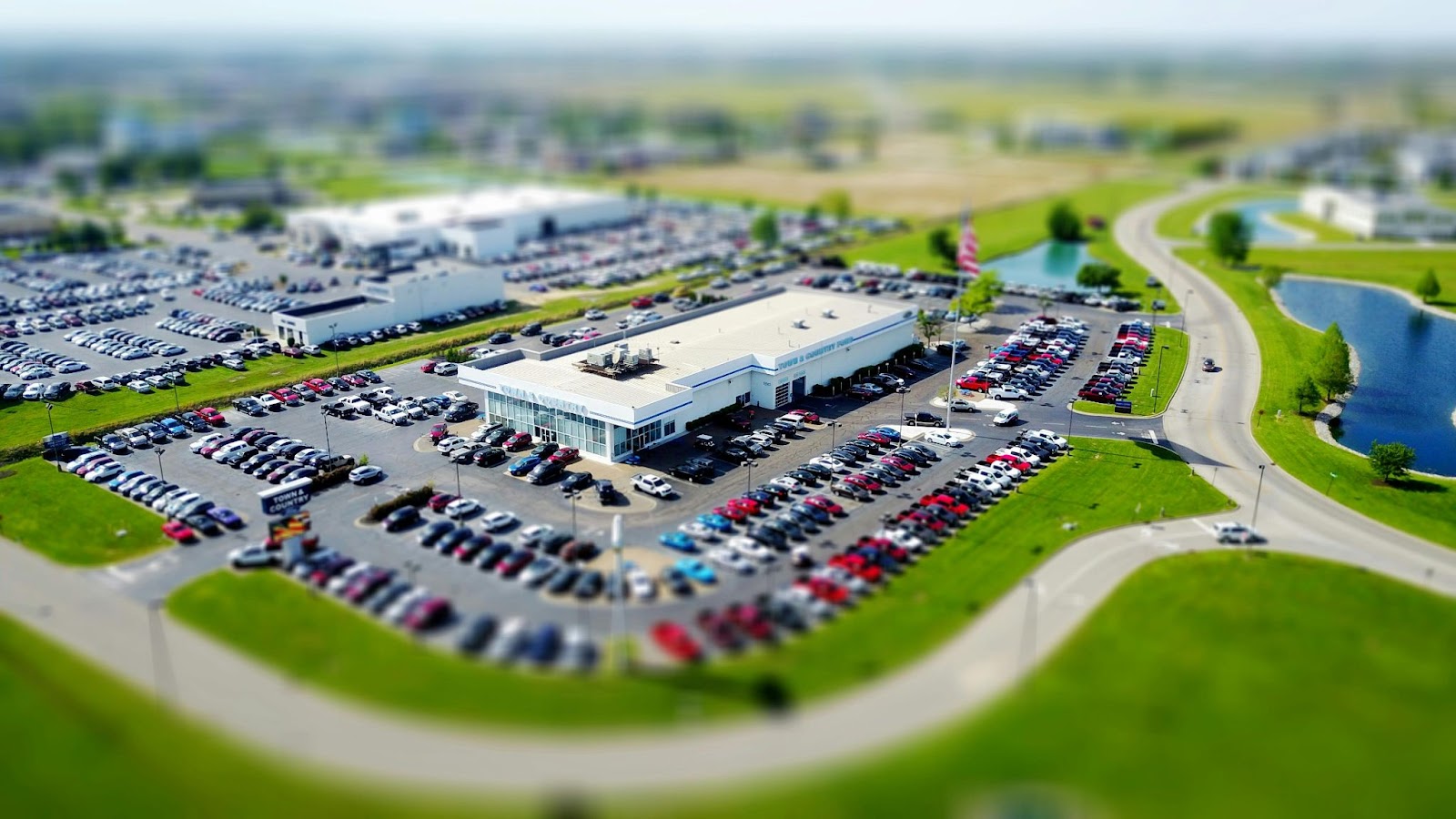 An aerial view of a car dealership.