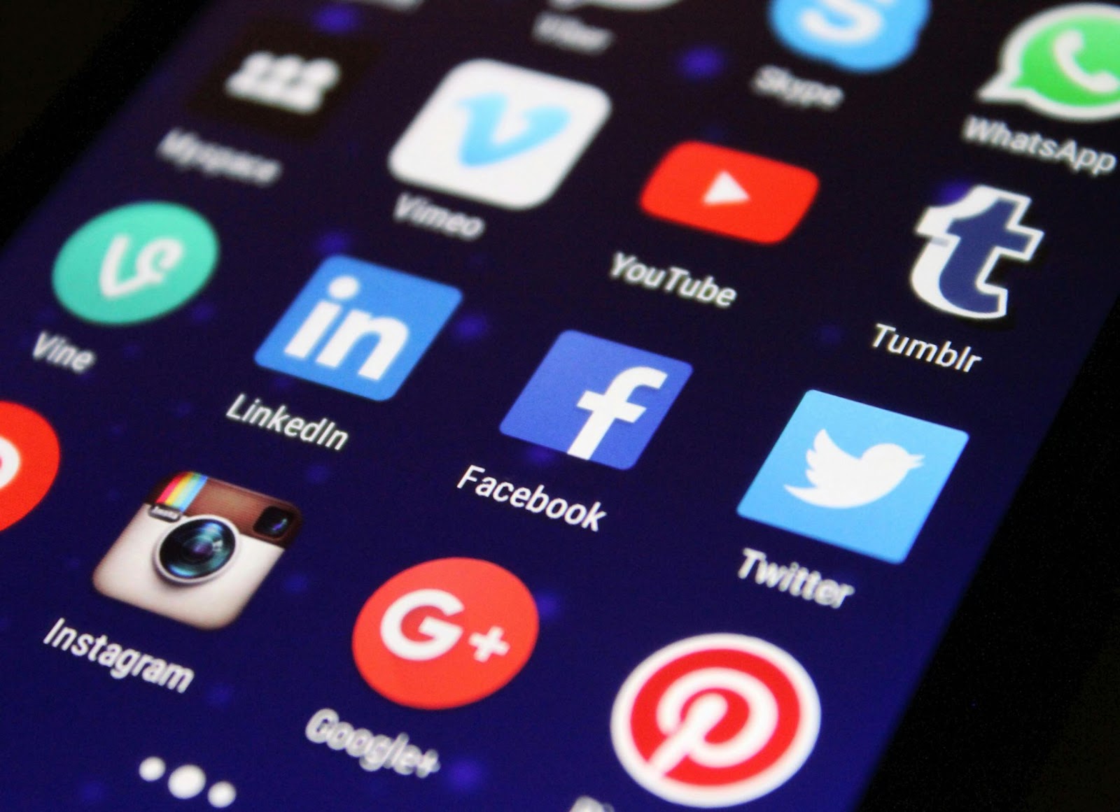 A smartphone with social media apps displayed.