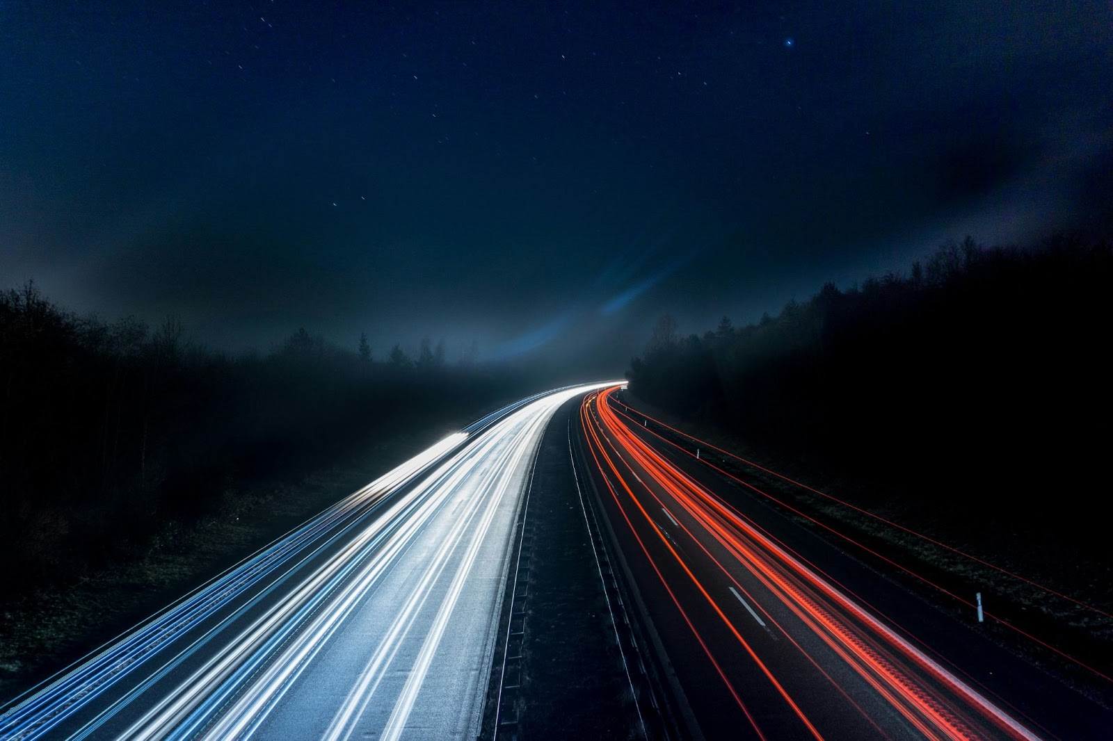 Light trails on a highway at night.